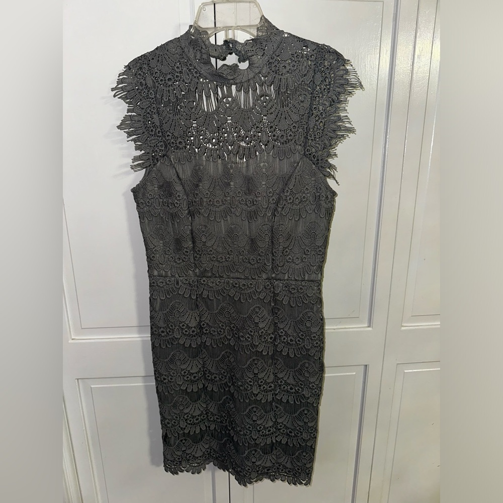 Light gray fitted mini dress with open back